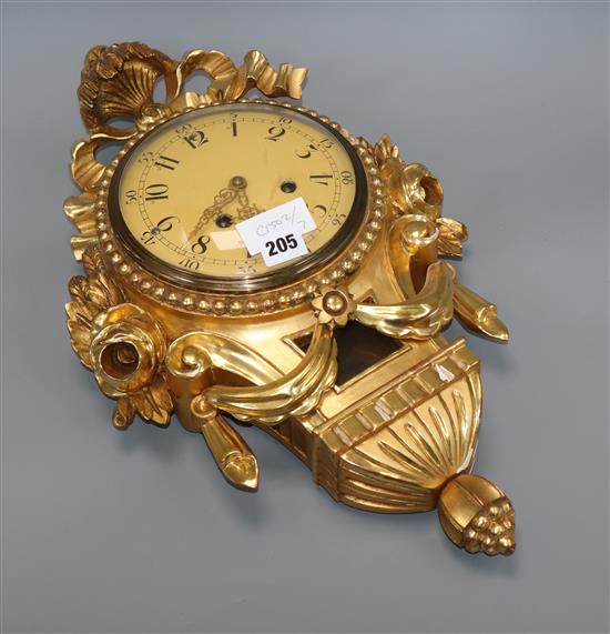 A Swedish giltwood cartel clock